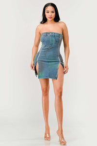 Denim Rush Hour Dress | Model wearing a strapless denim mini dress featuring a structured bust design, zipper accents on both sides creating adjustable slits, and subtle distressed details for a chic and edgy look - Rêves dorés