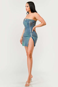 Denim Rush Hour Dress | Model wearing a strapless denim mini dress featuring a structured bust design, zipper accents on both sides creating adjustable slits, and subtle distressed details for a chic and edgy look - Rêves dorés